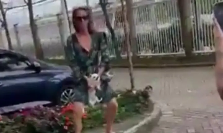 Mulher é presa em flagrante após ser filmada sacudindo cachorro em condomínio no Recreio; vídeo